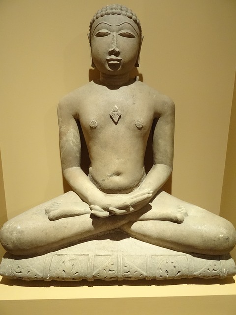 stone yoga figure