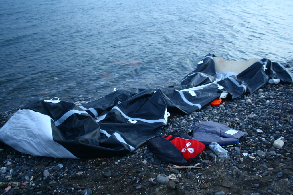 Deflated refugee boat. Photo by Kimberlyn David.